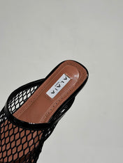 ALAIA FLAT MULES IN BLACK MESH FISHNET