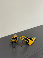 GREEN GEM-STUDDED SLINGBACK PUMPS IN YELLOW PATENT CALFSKIN