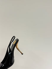 GREEN GEM-STUDDED SLINGBACK PUMPS IN BLACK PATENT CALFSKIN