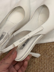 PRADA 26S SLINGBACK PUMPS IN WHITE PATENT CALFSKIN