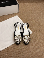 CHANEL 26S SLINGBACK FLATS IN BLACK CALFSKIN CAMELLIA PEARL