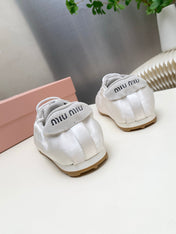 MIUMIU 26S SNEAKERS IN WHITE PLUME SATIN