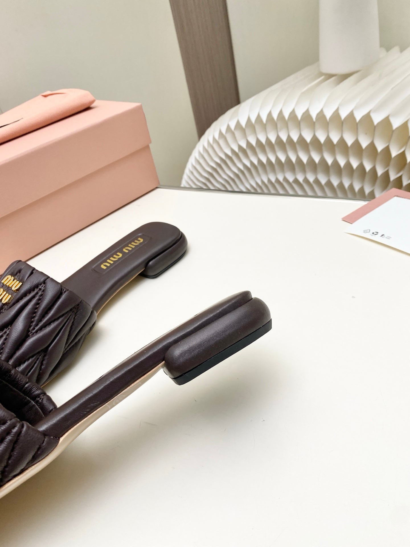 MIUMIU 26S MATELASSE SLIDES IN DARK BROWN CALFSKIN