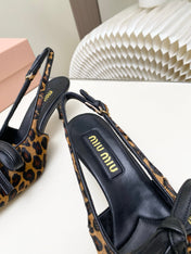 MIUMIU 26S SLINGBACK PUMPS 55MM IN LEOPARD PRINT CALF HAIR WITH BOW