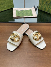 FLAT MULE IN WHITE CALFSKIN WITH GOLD HARDWARE