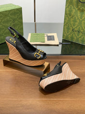 GG WEDGE PLATFORM IN BLACK CALFSKIN WITH GOLD HARDWARE