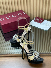 GUCCI 26S HIGH-HEELED SANDALS 125 MM IN BLACK SATIN AND GOLD CALFSKIN