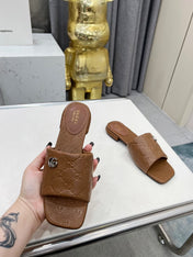 GG CASUAL SLIPPERS IN BROWN CALFSKIN LOGO EMBOSSING