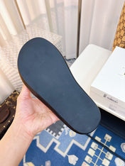 THE ROW 26S CROSSED PADDED SLIDES IN WHITE CALFSKIN