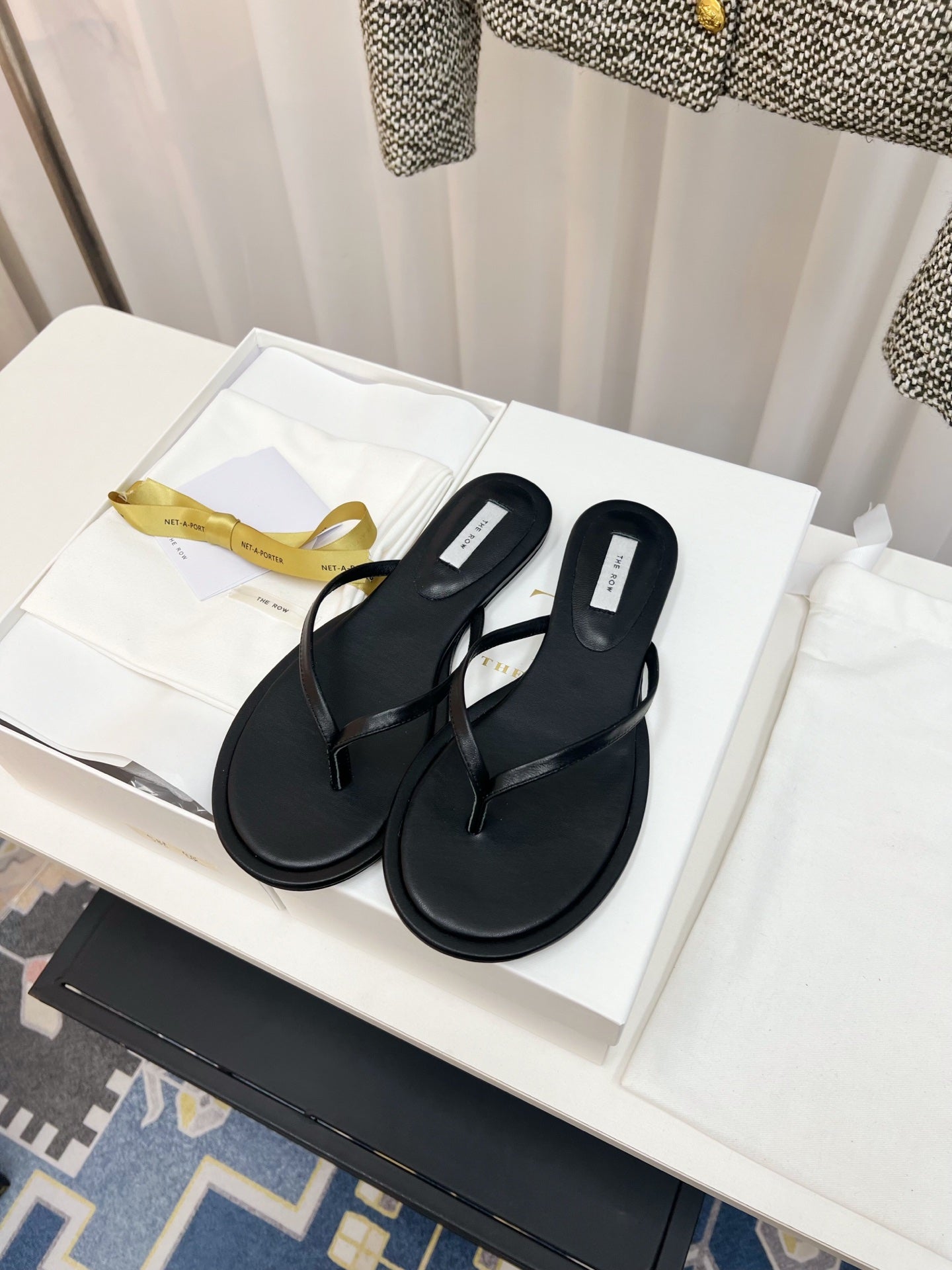 THE ROW 26S THONG SANDALS IN BLACK CALFSKIN
