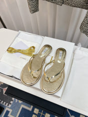 THE ROW 26S THONG SANDALS IN GOLD CALFSKIN
