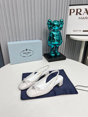 PRADA 26S ROUND TOE SLINGBACK PUMPS 40MM IN WHITE CALFSKIN WITH BOW