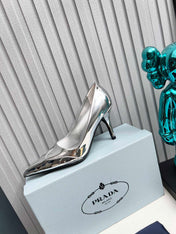 HIGH POINTED-TOE PUMPS IN SILVER GLOSSY CALFSKIN