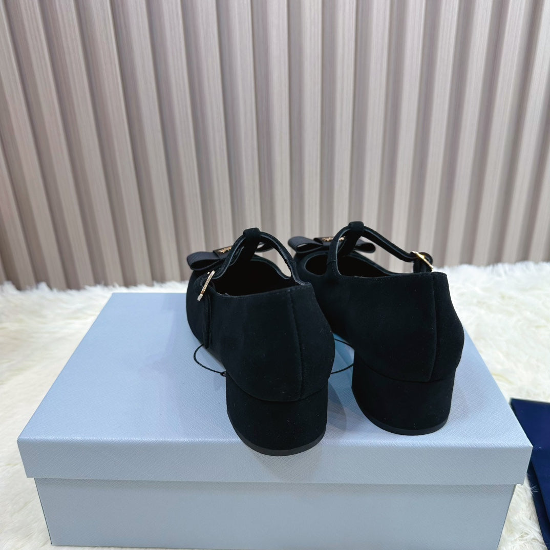 PRADA 26S T-STRAP MARY JANE PUMPS 40MM IN BLACK SUEDE WITH BOW