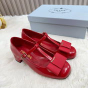 PRADA 26S T-STRAP MARY JANE PUMPS 40MM IN RED PATENT CALFSKIN WITH BOW
