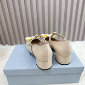 PRADA 26S T-STRAP MARY JANE PUMPS 40MM IN BEIGE PATENT CALFSKIN WITH BOW