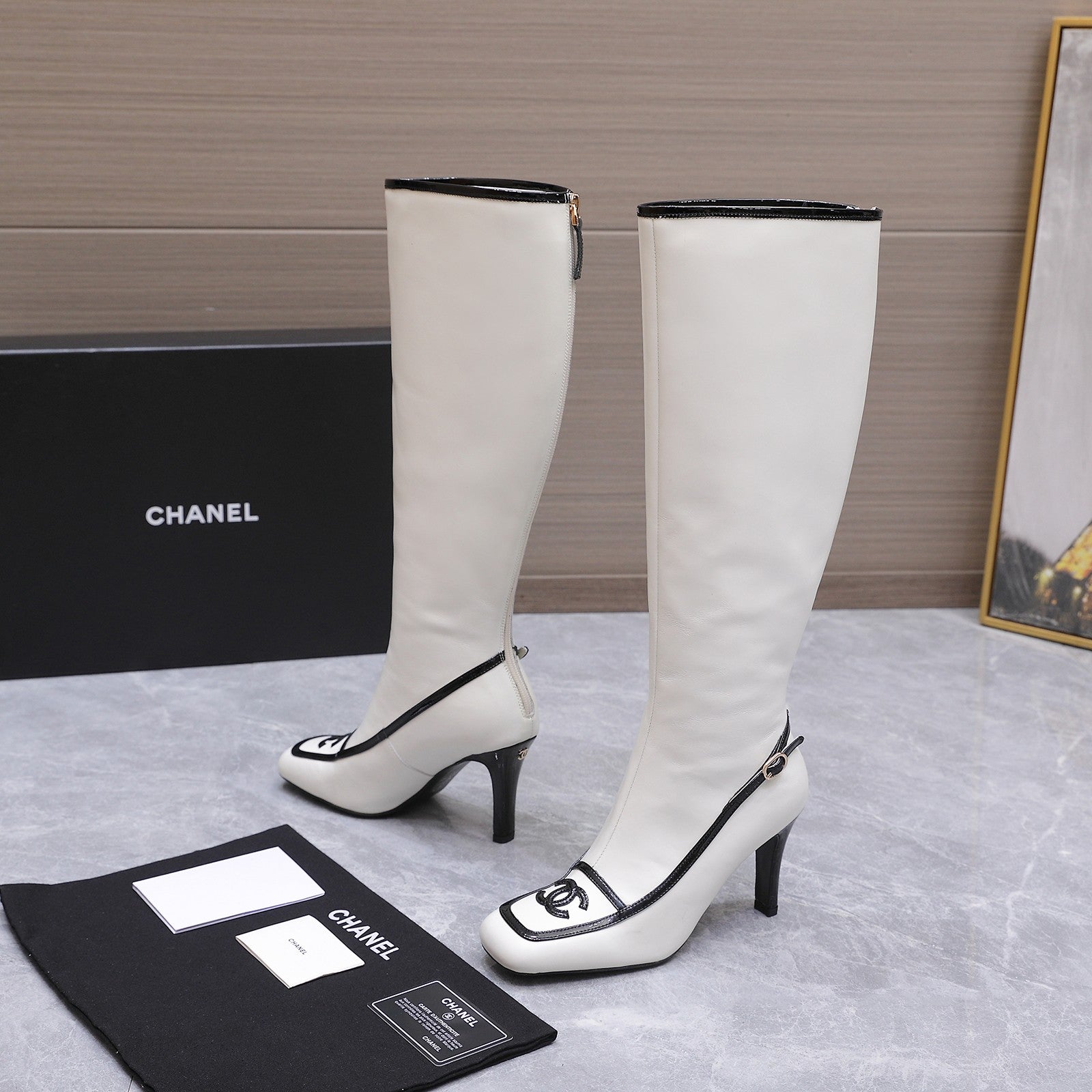 CHANEL 26S KNEE HIGH BOOTS 80 MM IN WHITE CALFSKIN WITH BLACK PATENT LEATHER TRIM AND CC LOGO ON TOE CAP
