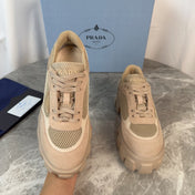 PRADA 26S GEAR SOLE SNEAKERS IN BEIGE SUEDE AND MESH