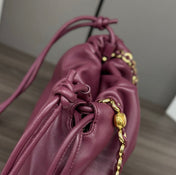 LOE MEDIUM 30 FLAMENCO PURSE BUCKET IN PLUM PURPLE LAMBSKIN