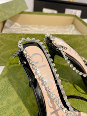 STRAPPY SANDAL WITH RHINESTONE CHAIN IN BLACK PATENT LEATHER