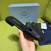 PRADA 25S SLIDES IN BLACK CALFSKIN