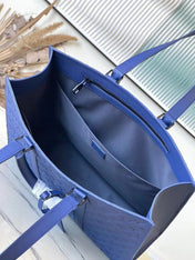 SAC PLAT 24H 41 IN SAPPHIRE BLUE MONOGRAM EMBOSSED TAURILLON