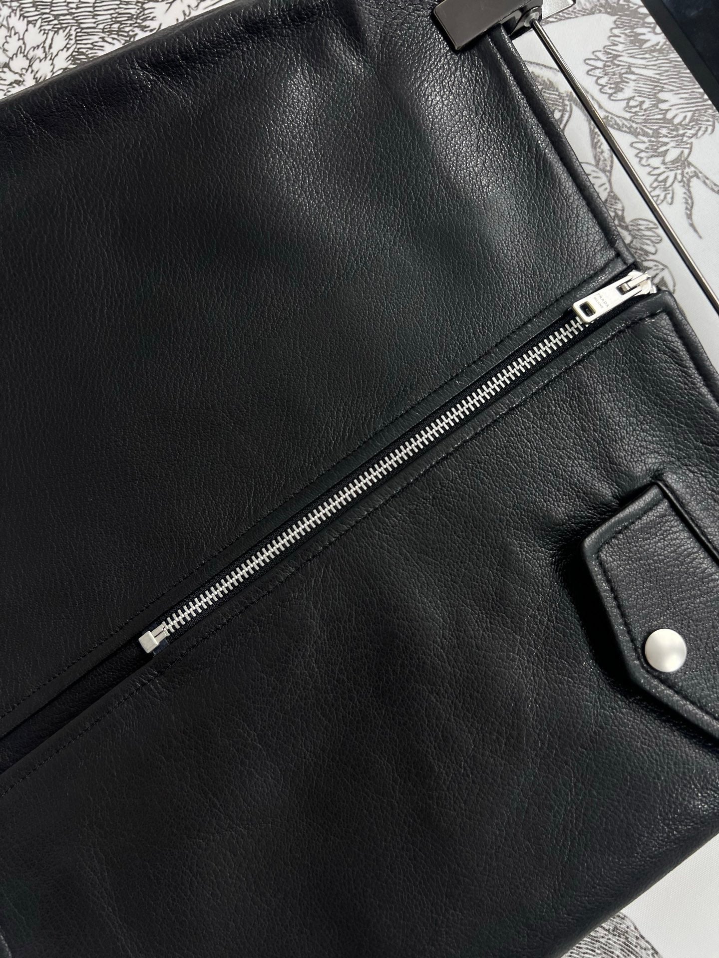 PRADA SHORT LEATHER SKIRT WITH ZIPPER 274475