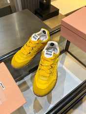 MIUMIU 26S SNEAKERS IN YELLOW FABRIC AND SUEDE