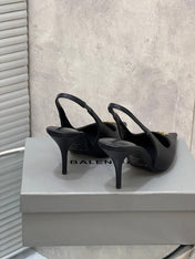 BALENCIAGA 25S HIGH-HEEL SLINGBACK 85 MM IN BLACK COW LEATHER WITH GOLD HARDWARE
