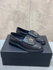 CHANEL 26S LOAFERS IN BLACK QUILTED CALFSKIN WITH CHAIN CC LOGO