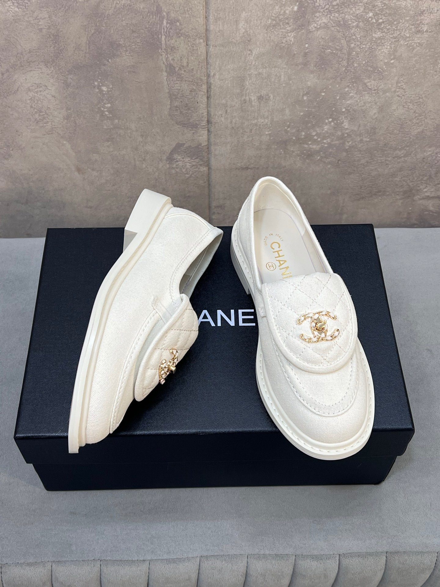 CHANEL 26S LOAFERS IN WHITE CANVAS WITH QUILTED FLAP & CHAIN CC LOGO