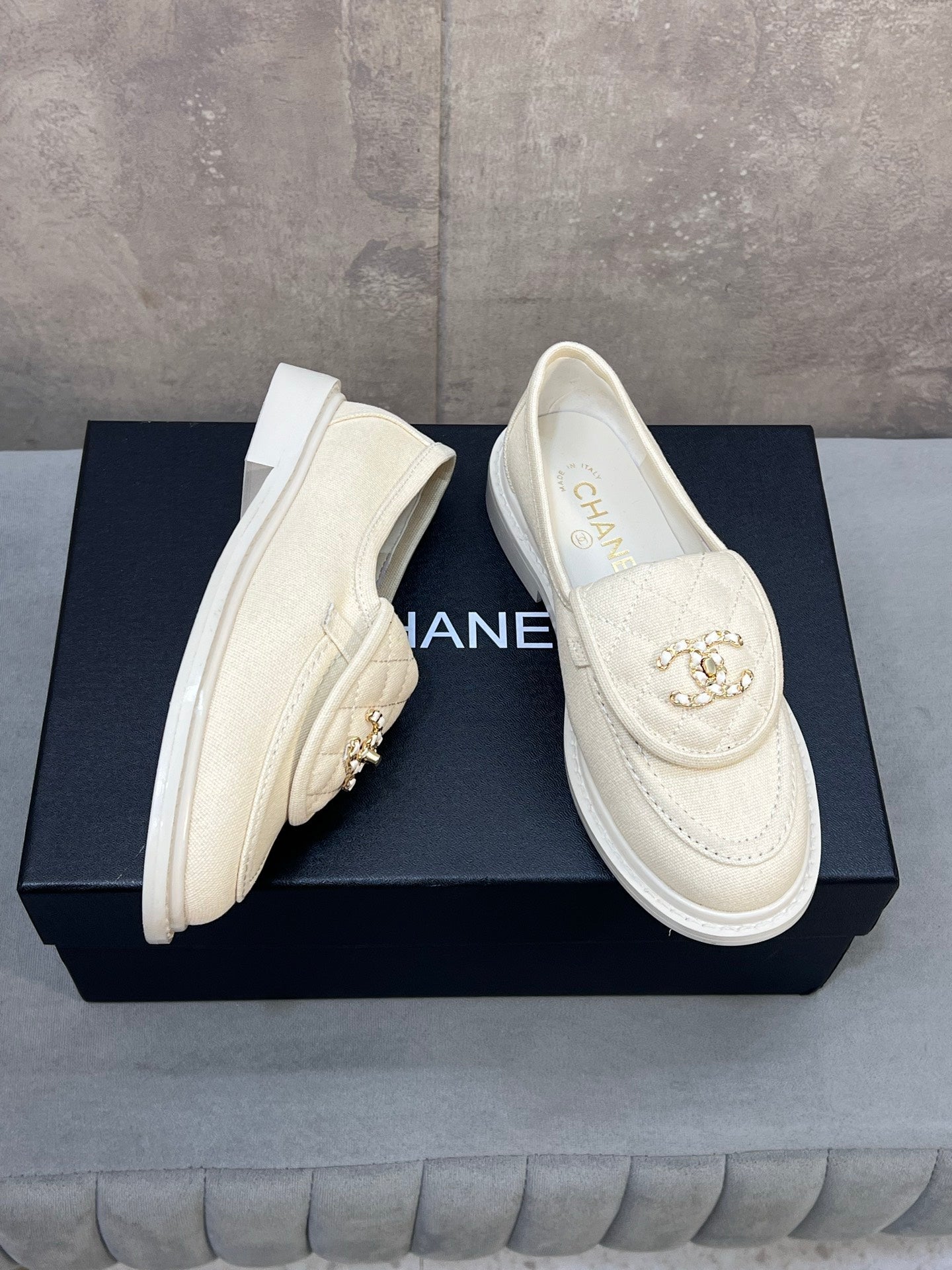 CHANEL 26S LOAFERS IN IVORY WHITE CANVAS WITH QUILTED FLAP & CHAIN CC LOGO