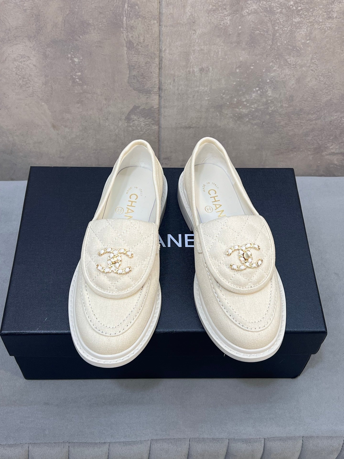 CHANEL 26S LOAFERS IN IVORY WHITE CANVAS WITH QUILTED FLAP & CHAIN CC LOGO