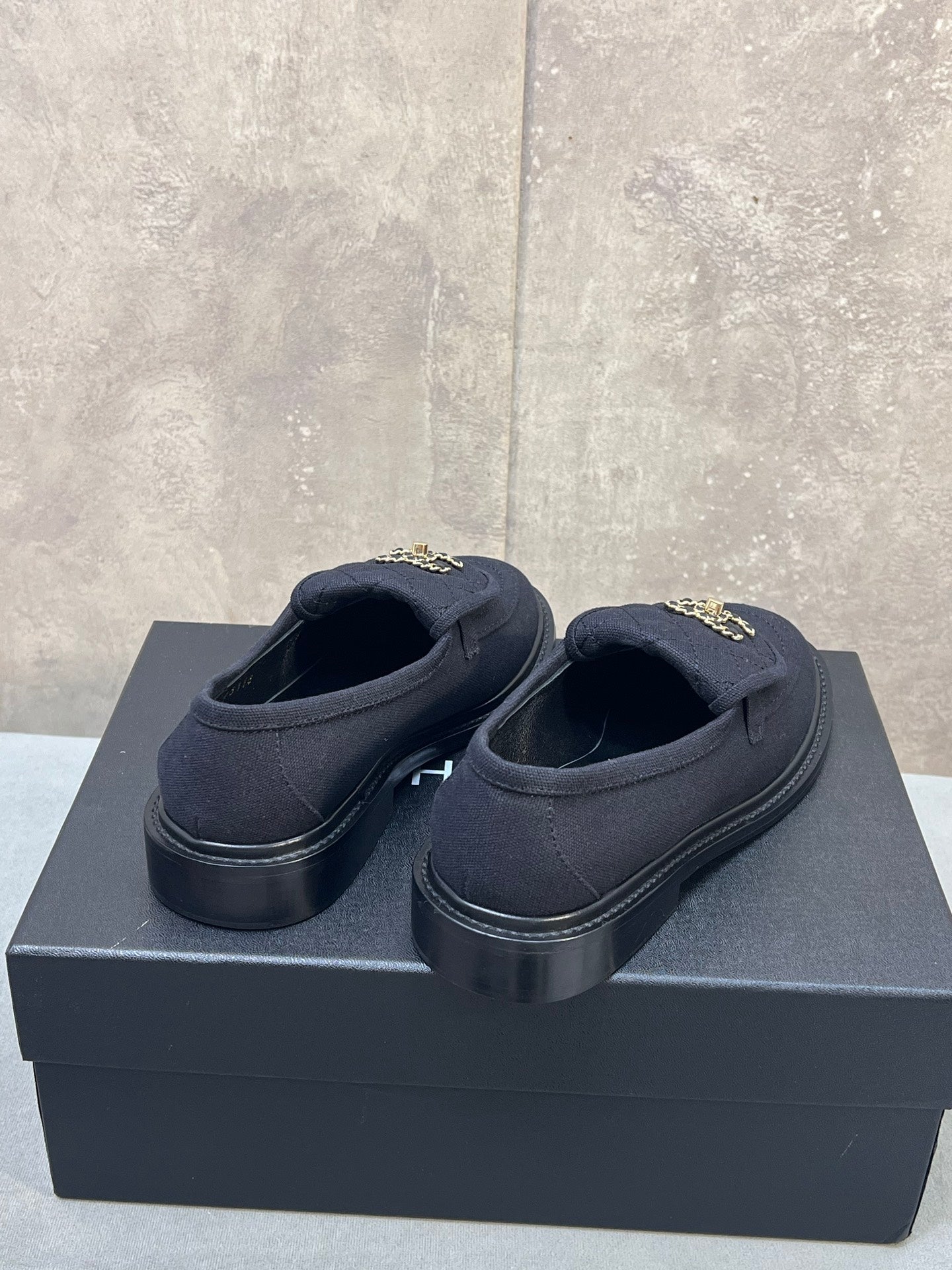 CHANEL 26S LOAFERS IN BLACK CANVAS WITH QUILTED FLAP & CHAIN CC LOGO