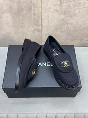 CHANEL 26S LOAFERS IN BLACK CANVAS WITH QUILTED FLAP & CHAIN CC LOGO