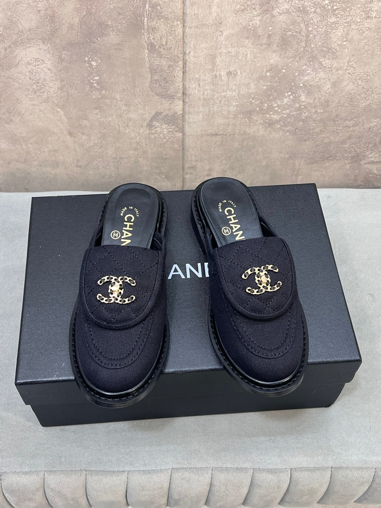CHANEL 26S MULE LOAFERS IN BLACK CANVAS WITH QUILTED FLAP & CHAIN CC LOGO