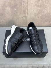 CHANEL 26S RUNNER CC LOGO SNEAKERS IN BLACK CALFSKIN