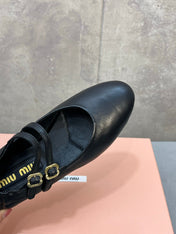 MIUMIU 26S DOUBLE STRAP MARY JANE FLATS IN BLACK SHEEPSKIN
