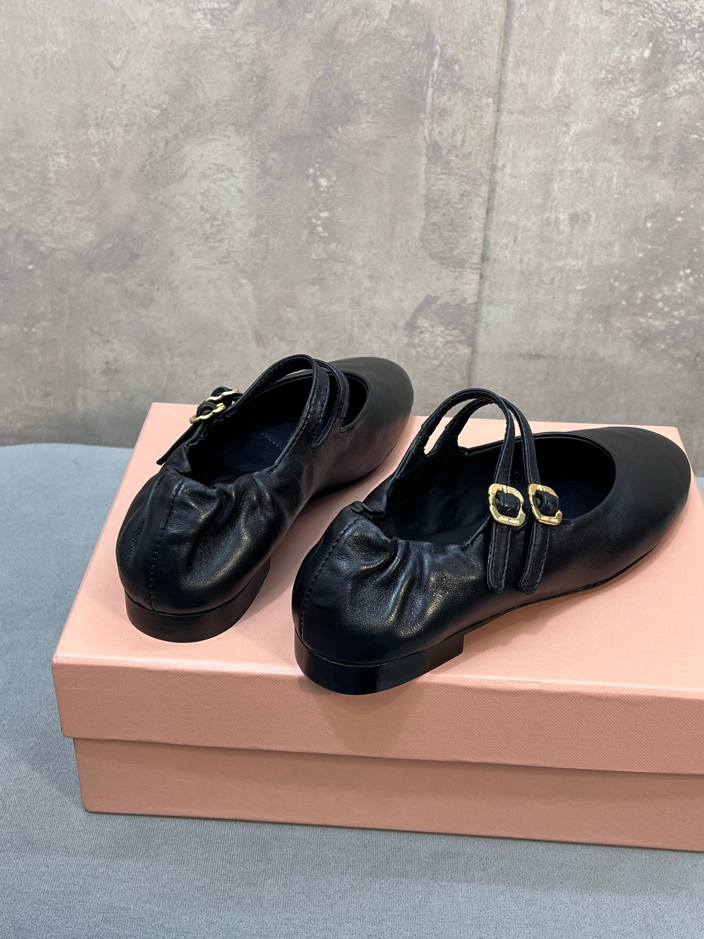 MIUMIU 26S DOUBLE STRAP MARY JANE FLATS IN BLACK SHEEPSKIN