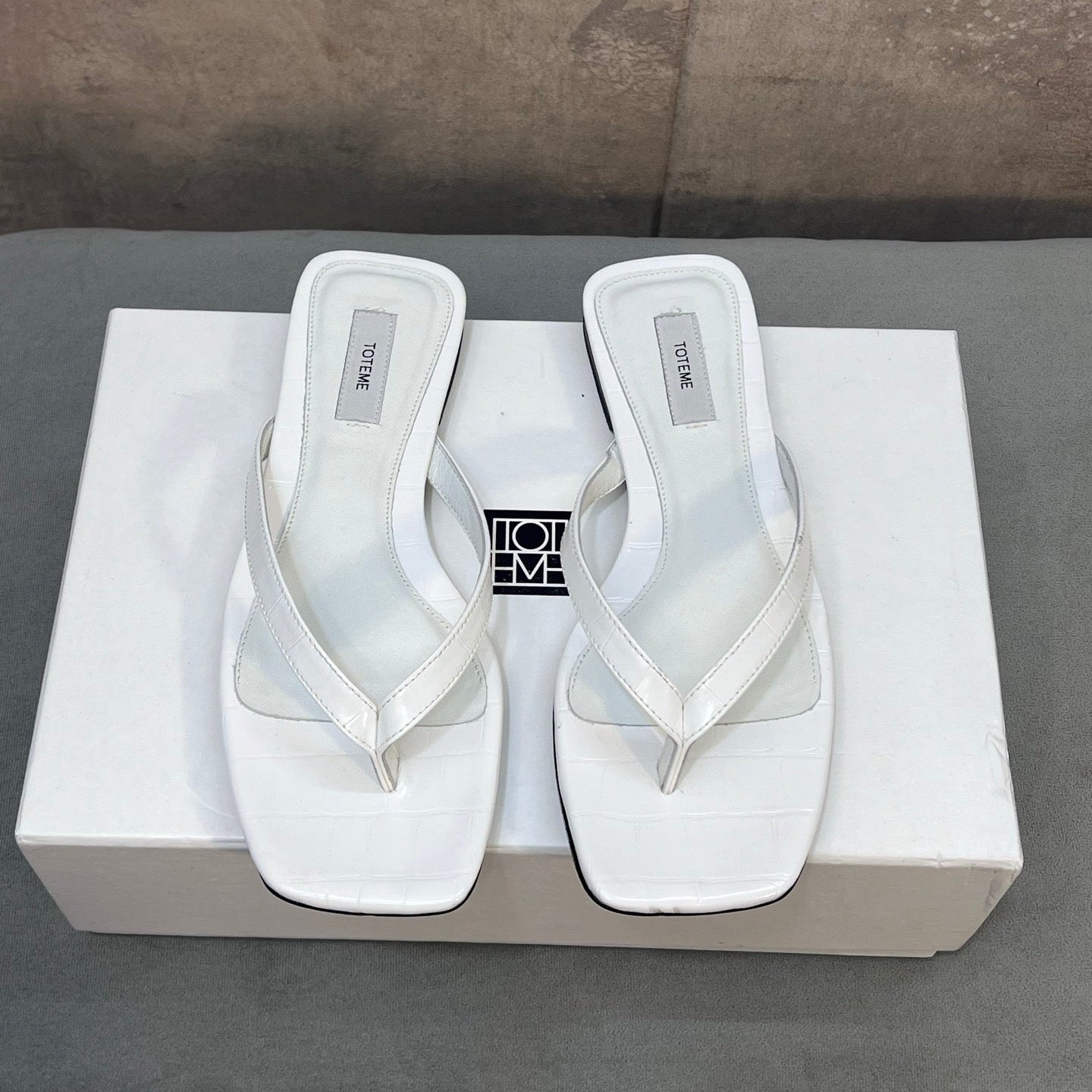 THE ROW 26S SQUARE TOE THONG SANDALS IN WHITE CROCODILE EMBOSSED CALFSKIN