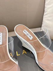 ALAIA 26S HIGH-HEEL WEDGE MULES 95 MM IN WHITE GLOSSY CALFSKIN