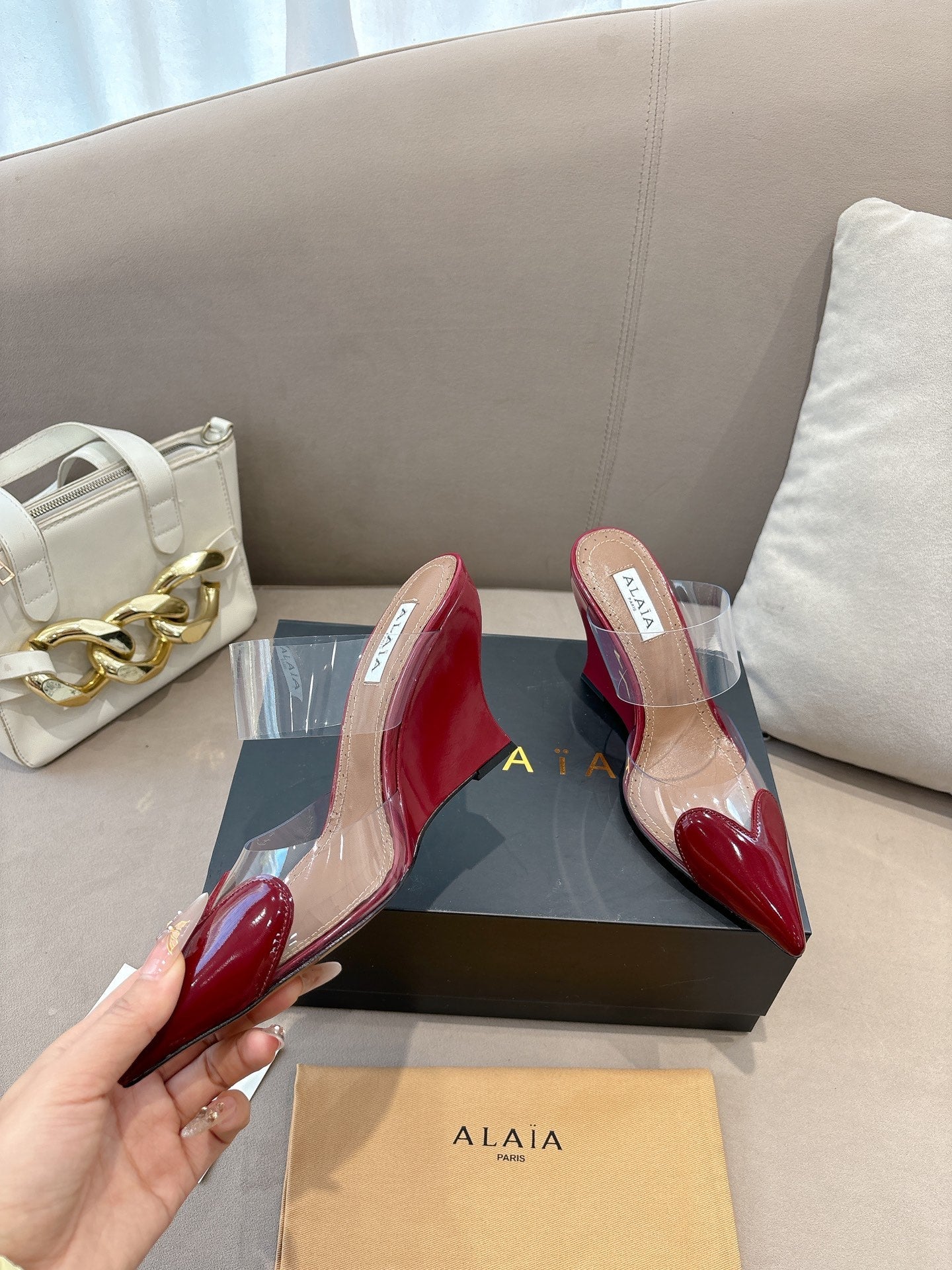 ALAIA 26S HIGH-HEEL WEDGE MULES 95 MM IN DARK RED GLOSSY CALFSKIN