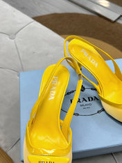 PRADA 25S TRIANGLE LOGO SLINGBACK PUMPS IN YELLOW MESH FABRIC