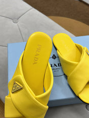 PRADA 25S SLIDE SANDALS IN YELLOW CALFSKIN LOGO