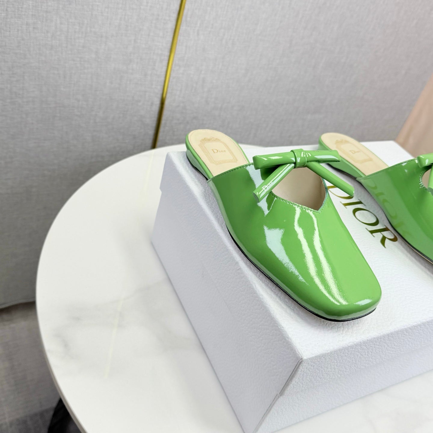 DIOR 26S PEARL-ACCENT BOW FLAT MULES IN FRESH GREEN GLOSSY CALFSKIN