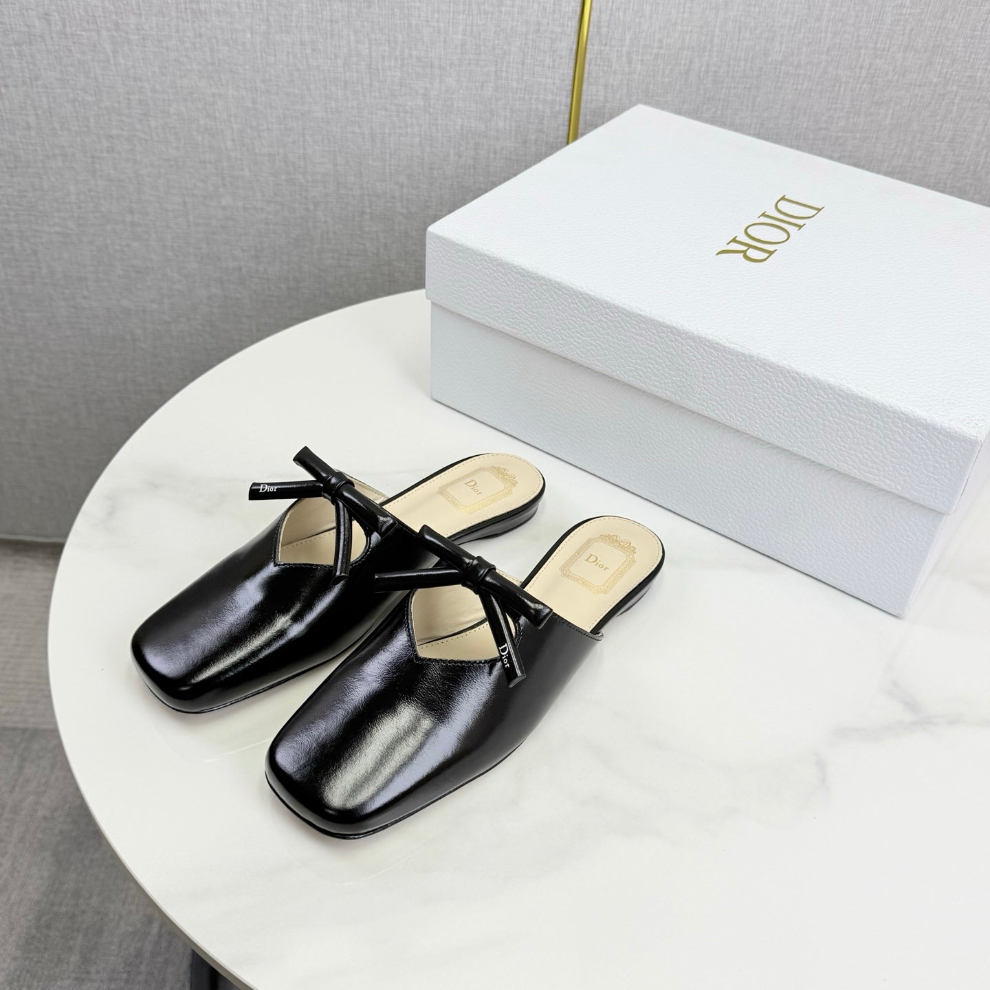 DIOR 26S PEARL-ACCENT BOW FLAT MULES IN BLACK GLOSSY CALFSKIN