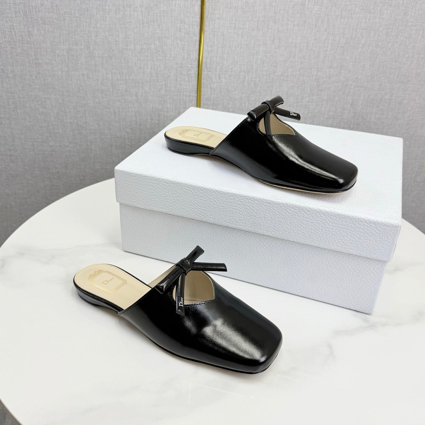 DIOR 26S PEARL-ACCENT BOW FLAT MULES IN BLACK GLOSSY CALFSKIN