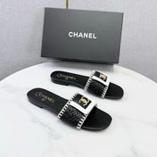 CHANEL 26S WOVEN STRAP SLIDES IN BLACK LAMBSKIN