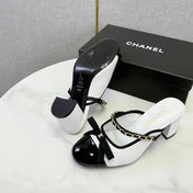 CHANEL 26S HIGH HEEL MULES 45 MM IN WHITE AND BLACK LAMBSKIN