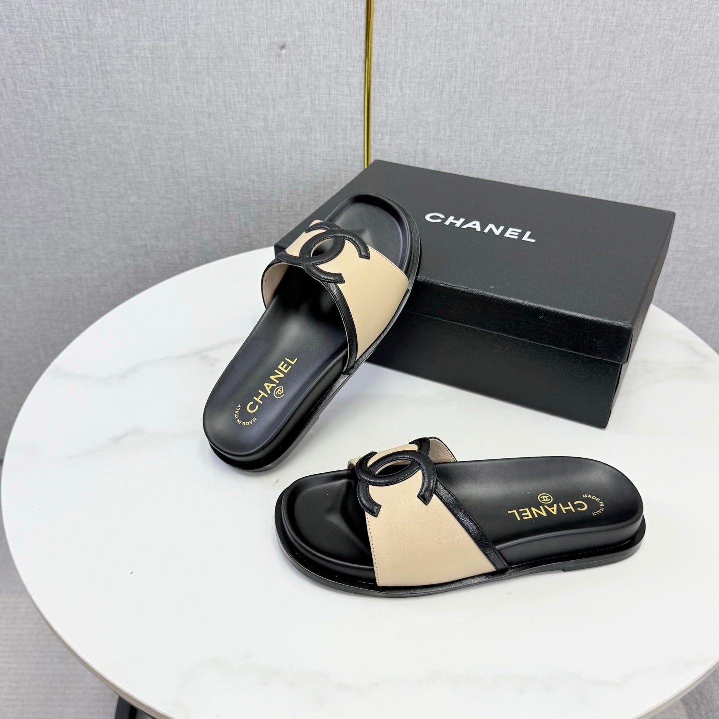 CHANEL 26S ICONIC CC SLIDES IN BEIGE LAMBSKIN